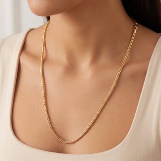 Superior Silver 24-inch rounded Franco chain necklace in 14kt yellow gold over 925 sterling silver on a model