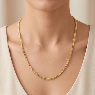 Superior Silver 26-inch rounded Franco chain necklace in 14kt yellow gold over 925 sterling silver worn on a model.