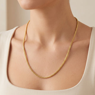 Superior Silver 26-inch rounded Franco chain necklace in 14kt yellow gold over 925 sterling silver worn on a model