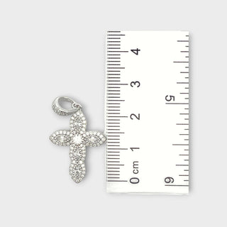Superior Silver 925 sterling silver cross pendant featuring sparkling cubic zirconia stones next to a measuring ruler.