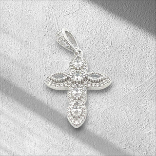 Superior Silver 925 sterling silver cross pendant featuring sparkling clear cubic zirconia stones.
