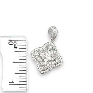 Superior Silver sterling silver flower charm pendant with sparkling cubic zirconia stones on a white background.