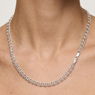 Superior Silver love chain necklace in polished 925 sterling silver with an interlocking link design on a model.