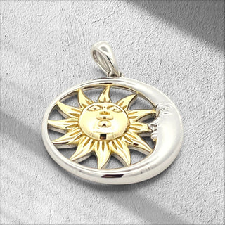 Superior Silver sun and moon pendant crafted from 925 sterling silver with 14k gold plated sun detail.
