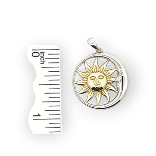 Superior Silver sun and moon pendant in 925 sterling silver with 14k gold plating, shown next to a ruler for scale.