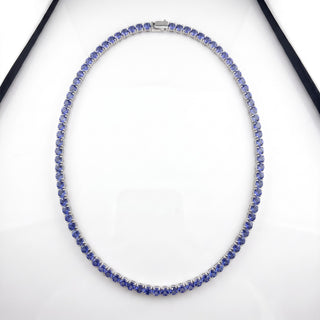 Superior Silver 18-inch tennis chain featuring round-cut blue-violet tanzanite stones in a sterling silver setting.
