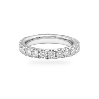 Thin shared-prong half eternity band moissanite ring in sterling silver
