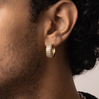 Three-Row Pavé Moissanite Huggie Hoop Earrings in yellow gold vermeil over sterling silver, worn on model