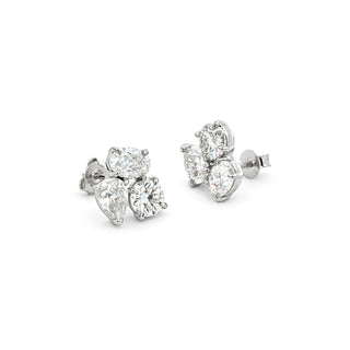 Three-stone round cluster moissanite stud earrings in sterling silver