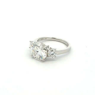 Three-Stone round with trillion sides moissanite ring in sterling silver, view 2