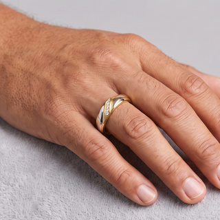 Three-Tone Diagonal Overlap Band with Stone Row Moissanite Ring in three-tone sterling silver, worn on hand