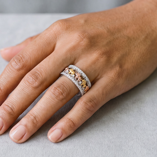 Three-Tone Elephant Parade Pavé Band Moissanite Ring in three-tone sterling silver, worn on hand