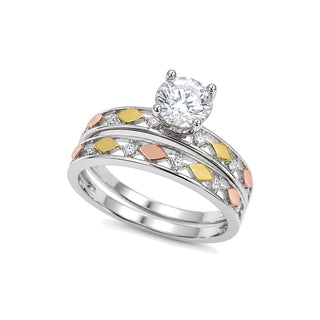 Three-Tone Round Solitaire Bridal Set Moissanite Ring in three-tone sterling silver