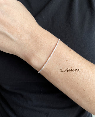 1.4mm Twisted Roc - Criss Cross Bracelet in Sterling Silver worn on the wrist