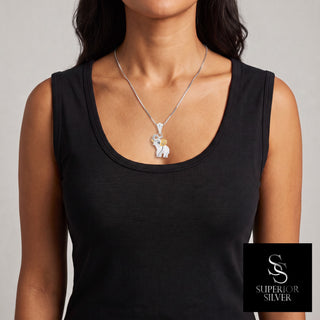 Two-Tone Baby Elephant Moissanite Pendant in Sterling Silver, worn on model