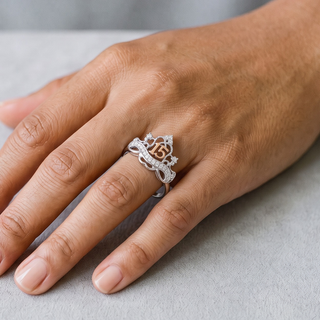 Two-Tone Quinceanera 15 Filigree Tiara Moissanite Ring in two-tone sterling silver, worn on hand