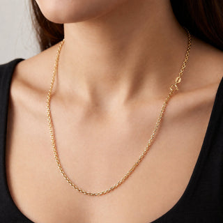 Superior Silver 20-inch 10K yellow gold wheat chain necklace with a delicate braided weave worn on a model